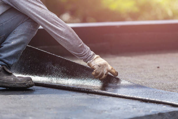 Professional Basement Waterproofing technician working in Owensburg, IN